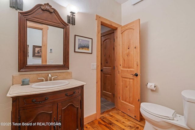 445 Aspen Ridge Trl, Alpine, WY 83128 - bathroom with vanity and wood finished floors