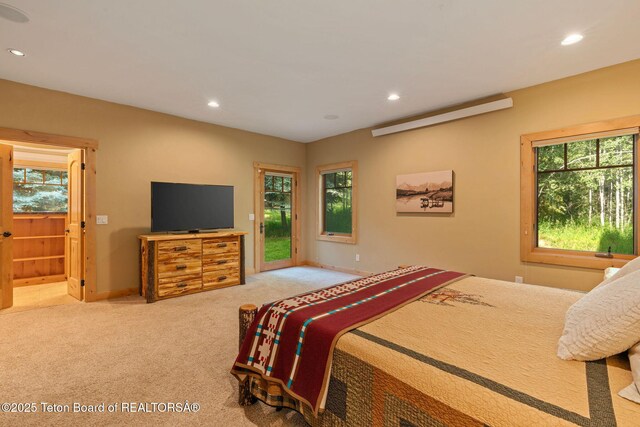 445 Aspen Ridge Trl, Alpine, WY 83128 - bedroom featuring recessed lighting, carpet, and access to exterior