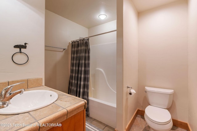 445 Aspen Ridge Trl, Alpine, WY 83128 - full bath with shower / bath combo with shower curtain, vanity, and tile patterned flooring