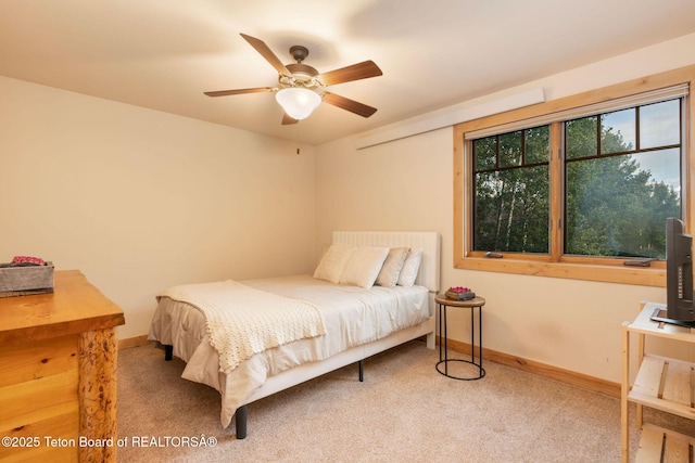 445 Aspen Ridge Trl, Alpine, WY 83128 - bedroom featuring carpet and a ceiling fan