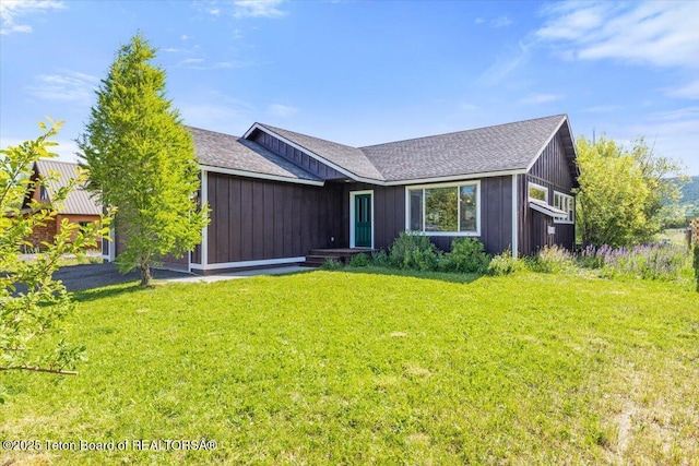 172 Brome Dr, Victor, ID 83455 - view of front of property featuring a front lawn and roof with shingles