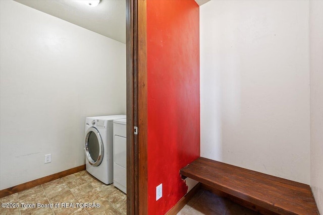 172 Brome Dr, Victor, ID 83455 - washroom featuring washer and dryer and baseboards