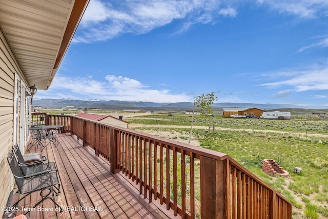 25 Neosha Trl, Boulder, WY 82923 - wooden deck featuring a mountain view and a view of countryside