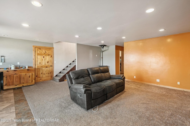 25 Neosha Trl, Boulder, WY 82923 - carpeted living room with recessed lighting and stairway
