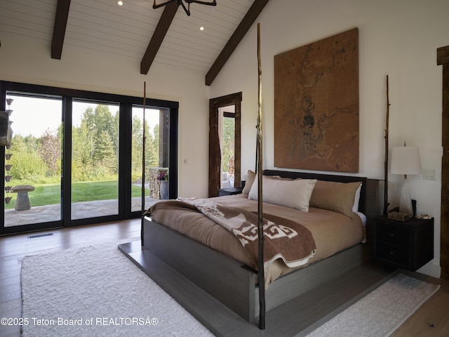 5060 W Eagle Rd, Wilson, WY 83014 - bedroom featuring wood finished floors, access to exterior, wooden ceiling, and recessed lighting