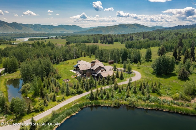 5060 W Eagle Rd, Wilson, WY 83014 - view from above of property featuring a water and mountain view and a forest
