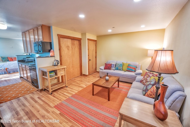 200 Homestead Rd Unit 309, Victor, ID 83455 - living area with light wood finished floors and recessed lighting