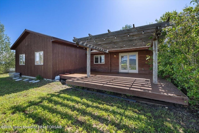 7302 Lakeside Rd, Victor, ID 83455 - rear view of property with a pergola, a wooden deck, and a yard