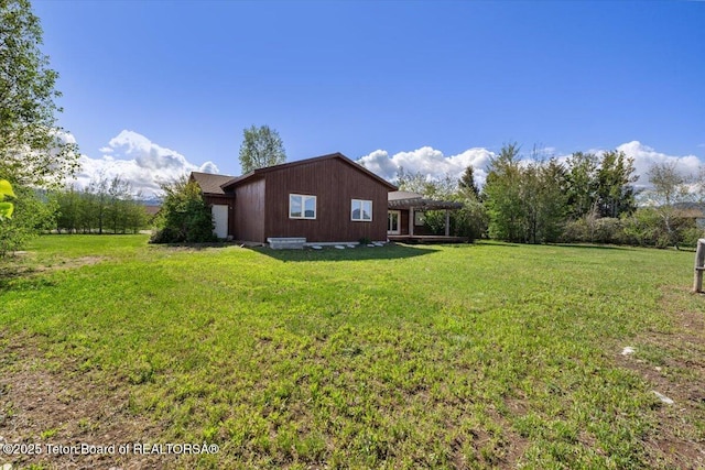 7302 Lakeside Rd, Victor, ID 83455 - view of property exterior with a yard