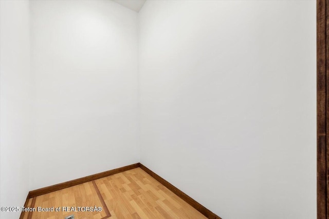 7302 Lakeside Rd, Victor, ID 83455 - spare room with baseboards and light wood-style flooring