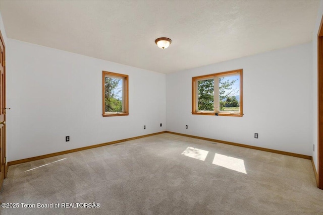 7302 Lakeside Rd, Victor, ID 83455 - carpeted spare room featuring baseboards