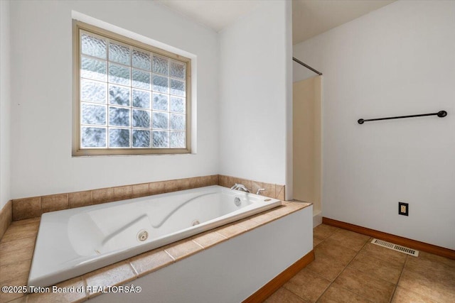 7302 Lakeside Rd, Victor, ID 83455 - full bathroom with a jetted tub, tile patterned floors, and a shower