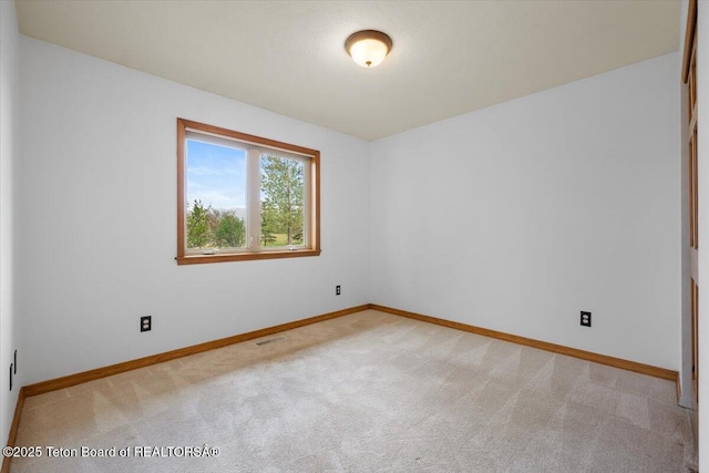 7302 Lakeside Rd, Victor, ID 83455 - unfurnished room with light colored carpet
