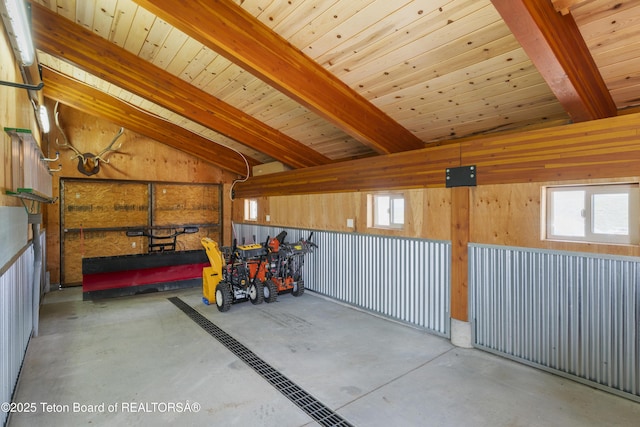 1802 Dusty Trl, Auburn, WY 83111 - garage featuring wooden walls and wooden ceiling
