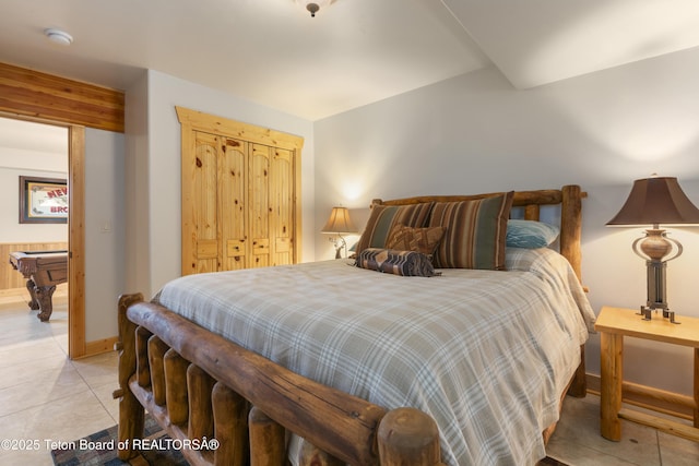 1802 Dusty Trl, Auburn, WY 83111 - bedroom with light tile patterned flooring and baseboards