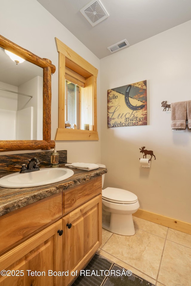 1802 Dusty Trl, Auburn, WY 83111 - bathroom featuring vanity and tile patterned flooring