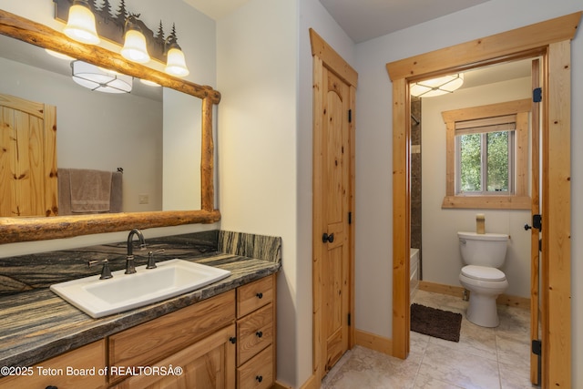 1802 Dusty Trl, Auburn, WY 83111 - full bathroom featuring vanity and toilet