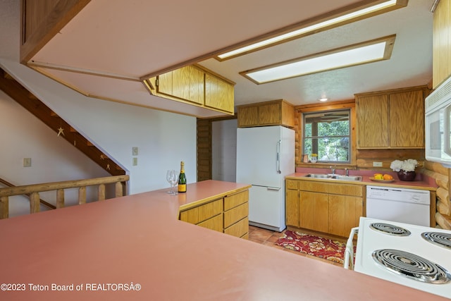 4821 S 2000 E, Victor, ID 83455 - kitchen featuring white appliances and light countertops