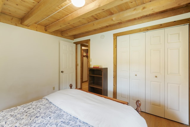 4821 S 2000 E, Victor, ID 83455 - bedroom featuring a wooden ceiling with exposed beams, light wood-style floors, and a closet