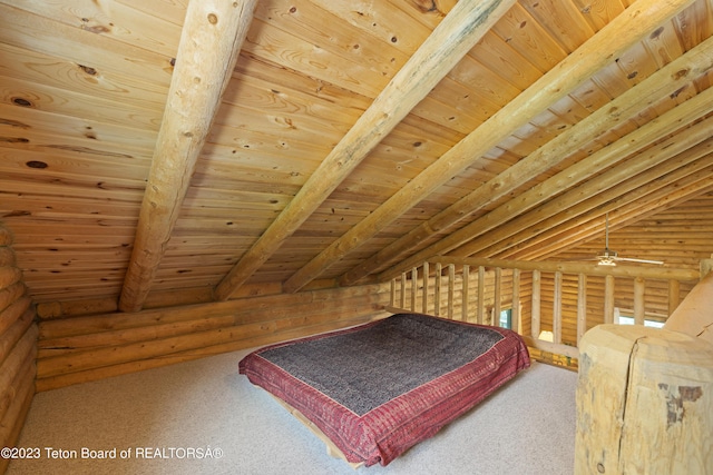 4821 S 2000 E, Victor, ID 83455 - bedroom featuring log walls, a wood ceiling with exposed beams, and carpet