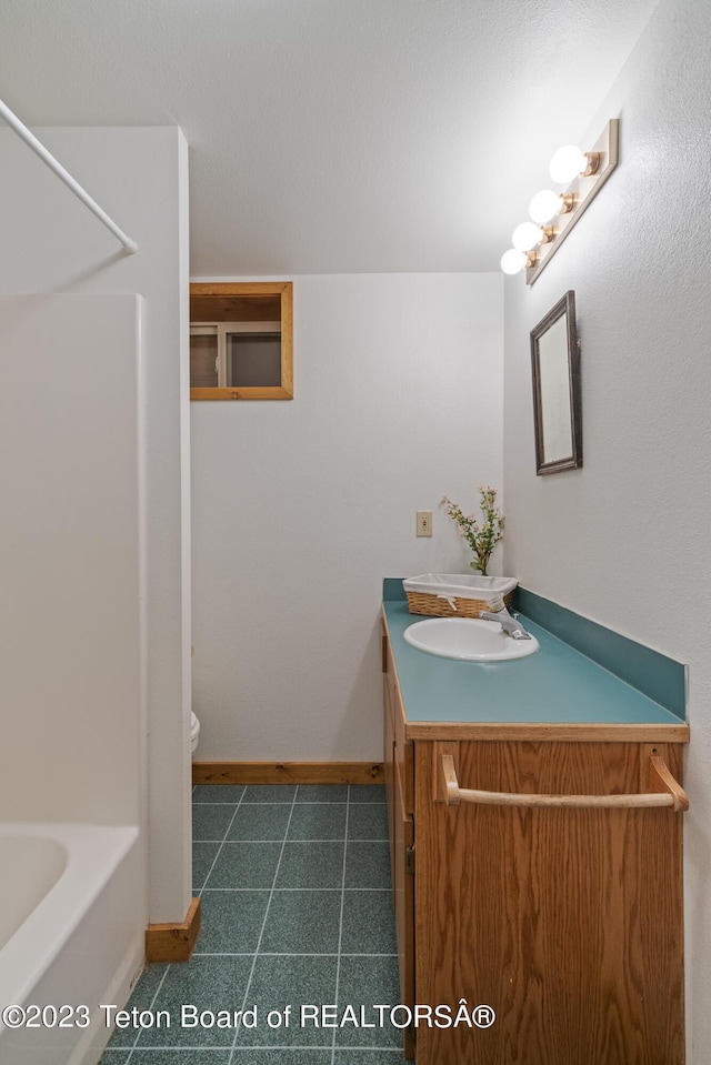 4821 S 2000 E, Victor, ID 83455 - full bathroom featuring double vanity and shower / tub combination