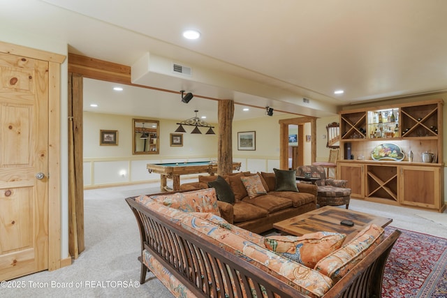 73657339 Summer Breeze Trl, Tetonia, ID 83452 - living room with light colored carpet, a wainscoted wall, billiards, and recessed lighting