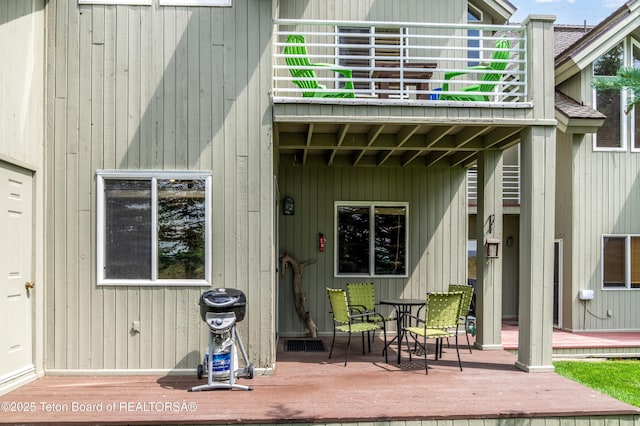 910 Powder Valley Rd Unit 20, Driggs, ID 83422 - rear view of property with a balcony, outdoor dining area, and a deck