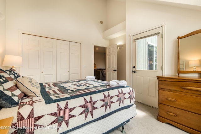 910 Powder Valley Rd Unit 20, Driggs, ID 83422 - bedroom featuring light colored carpet, a closet, and high vaulted ceiling