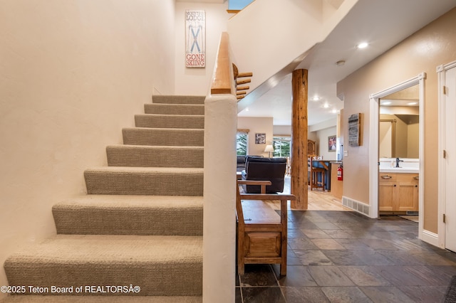 910 Powder Valley Rd Unit 20, Driggs, ID 83422 - staircase with stone tile flooring and recessed lighting