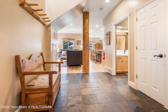 910 Powder Valley Rd Unit 20, Driggs, ID 83422 - hallway featuring stone tile floors and recessed lighting