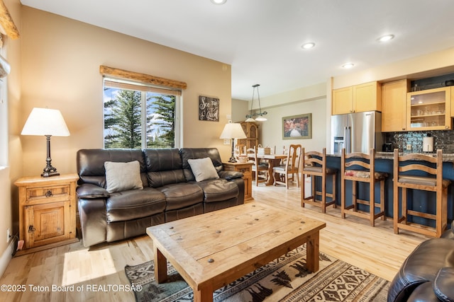 910 Powder Valley Rd Unit 20, Driggs, ID 83422 - living area featuring light wood-style flooring and recessed lighting