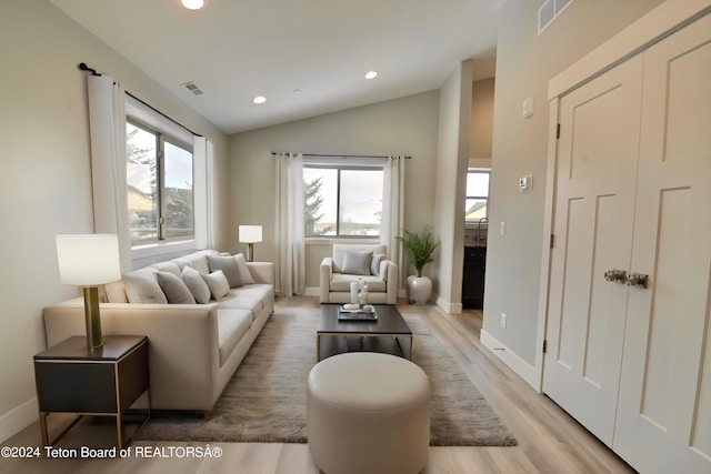 140 Homestead Rd Unit 508, Victor, ID 83455 - living area with recessed lighting, lofted ceiling, and light wood-style flooring