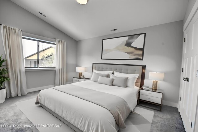 140 Homestead Rd Unit 508, Victor, ID 83455 - carpeted bedroom featuring vaulted ceiling and baseboards