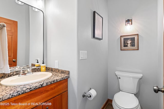92 Ashley Dr, Alpine, WY 83128 - half bathroom with toilet and vanity