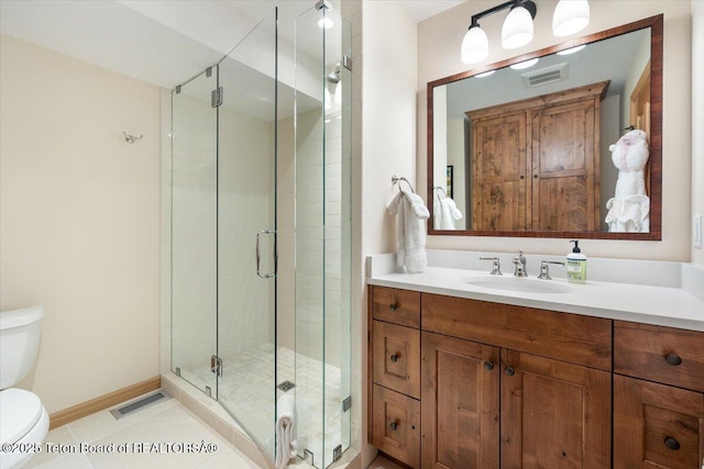 2620 N Fairways Pl W, Wilson, WY 83014 - bathroom with vanity and a stall shower