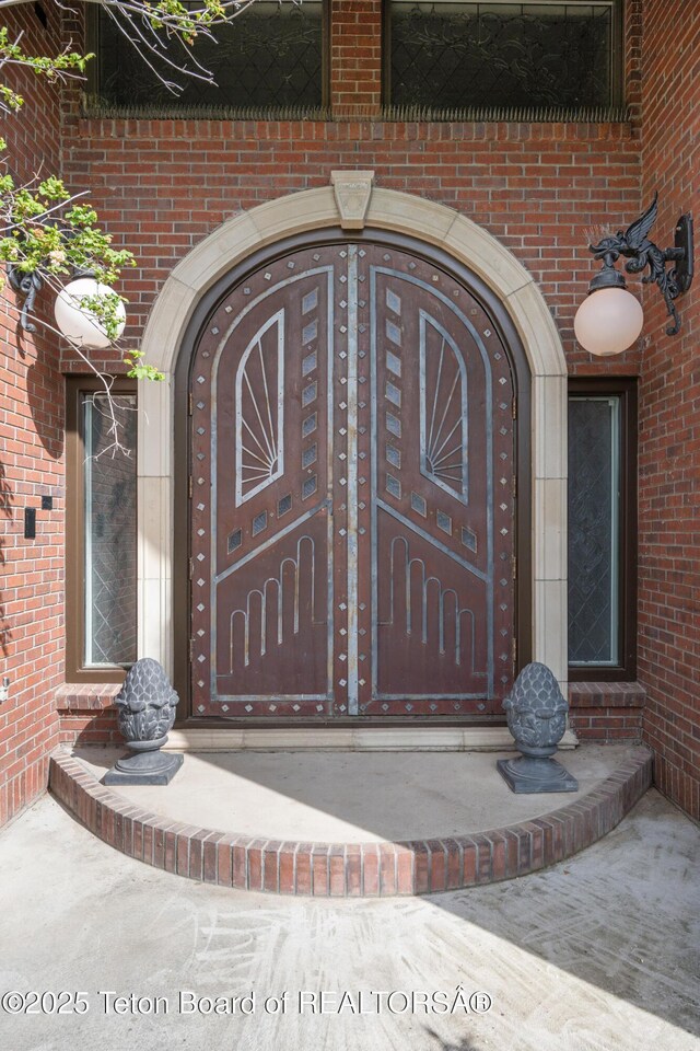 4976 S 49th, Idaho Falls, ID 83406 - doorway to property with brick siding