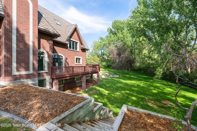 4976 S 49th, Idaho Falls, ID 83406 - view of green lawn with a deck