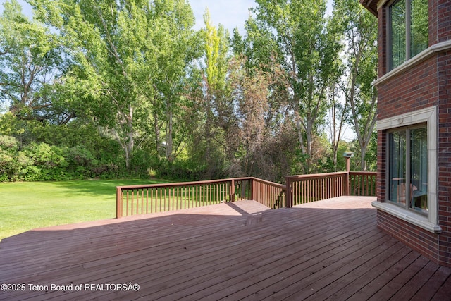 4976 S 49th, Idaho Falls, ID 83406 - deck featuring a lawn