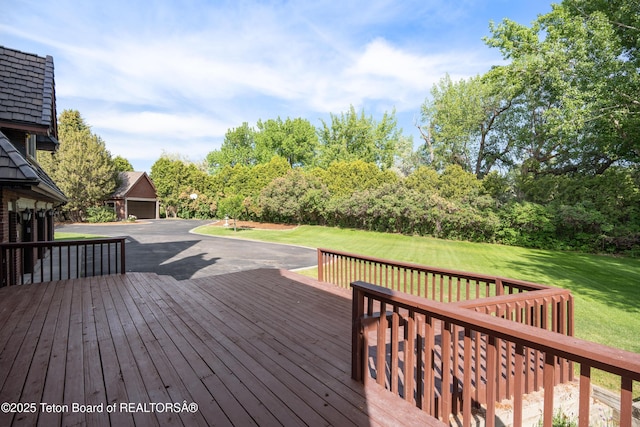 4976 S 49th, Idaho Falls, ID 83406 - wooden deck featuring a yard