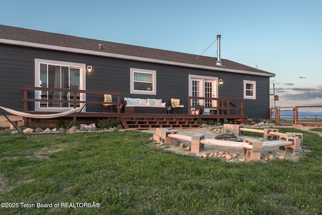 26 Merrimac Trl, Boulder, WY 82923 - back of house featuring a deck and an outdoor living space with a fire pit