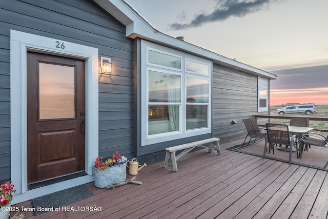 26 Merrimac Trl, Boulder, WY 82923 - deck at dusk with outdoor dining area