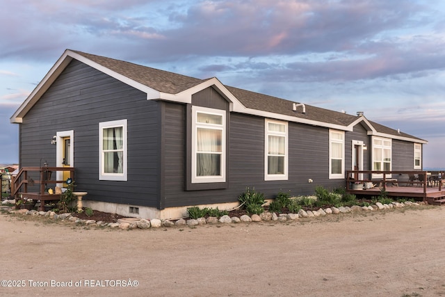 26 Merrimac Trl, Boulder, WY 82923 - view of side of home with a wooden deck