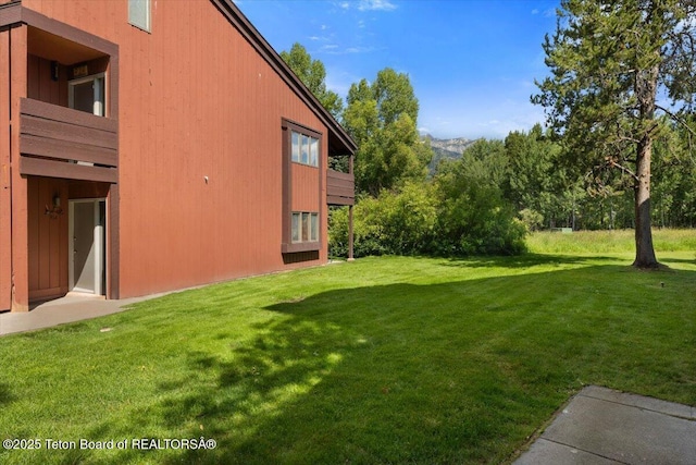 3705 N Teton Dr # 914, Wilson, WY 83014 - view of green lawn with a balcony