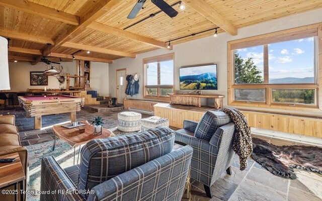 20 Trail Ride Ln, Cora, WY 82925 - living room with stone tile flooring, pool table, a wooden ceiling with exposed beams, and ceiling fan