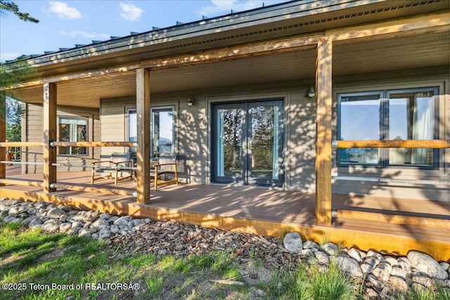 20 Trail Ride Ln, Cora, WY 82925 - rear view of property with french doors and covered porch