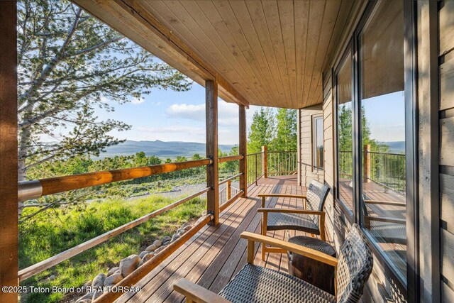20 Trail Ride Ln, Cora, WY 82925 - wooden deck with a mountain view