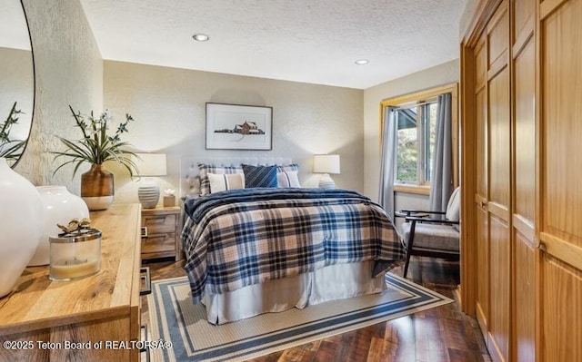 20 Trail Ride Ln, Cora, WY 82925 - bedroom featuring wood finished floors, a textured ceiling, and recessed lighting