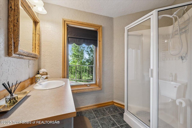 20 Trail Ride Ln, Cora, WY 82925 - full bathroom featuring vanity, a stall shower, a textured wall, and a textured ceiling