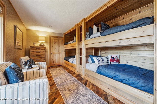 20 Trail Ride Ln, Cora, WY 82925 - bedroom featuring a textured ceiling and wood finished floors