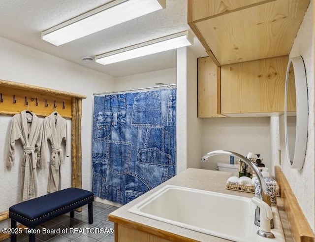 20 Trail Ride Ln, Cora, WY 82925 - bathroom featuring tile patterned floors, vanity, and a shower with shower curtain